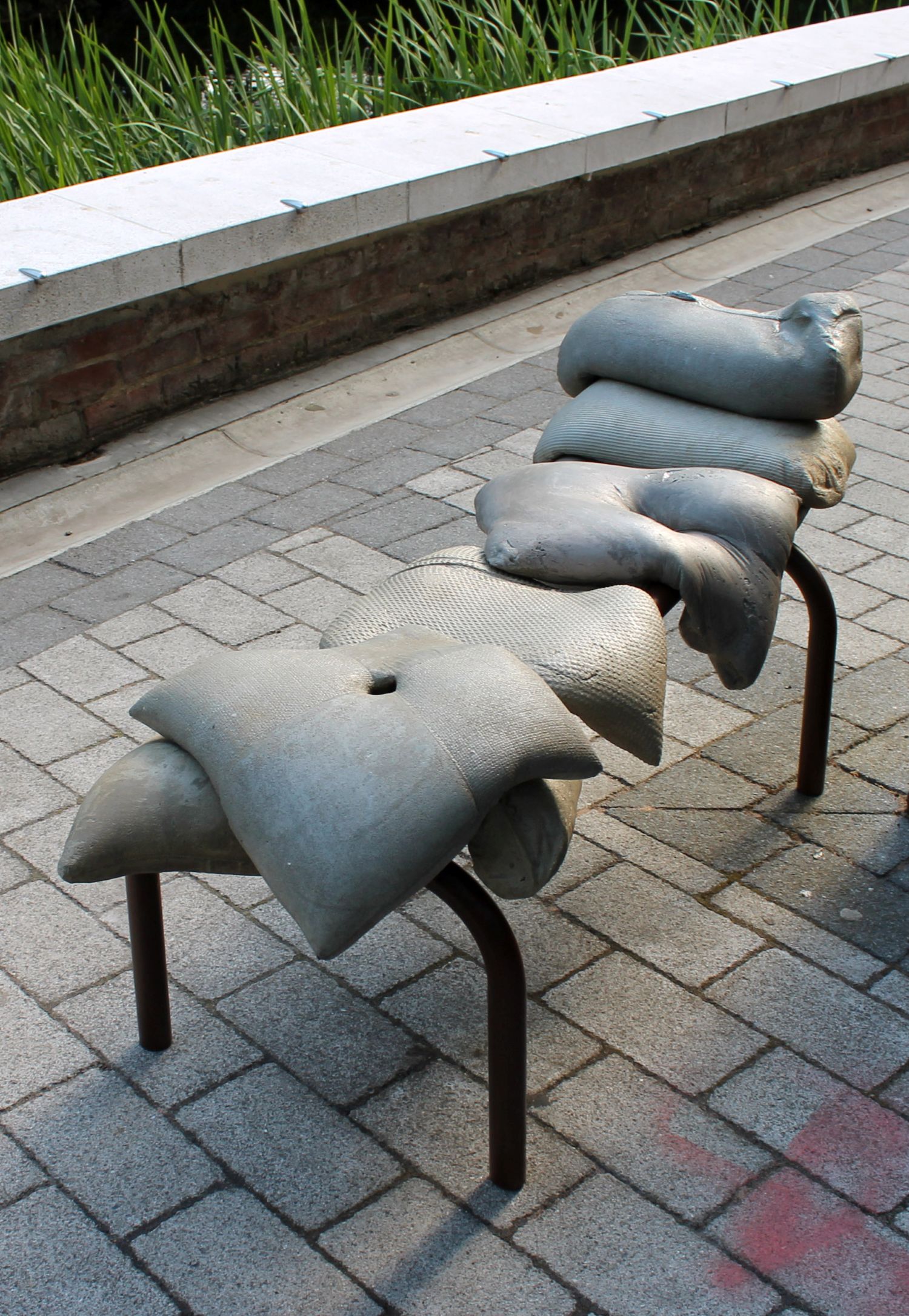 Comfy. Concrete bench.